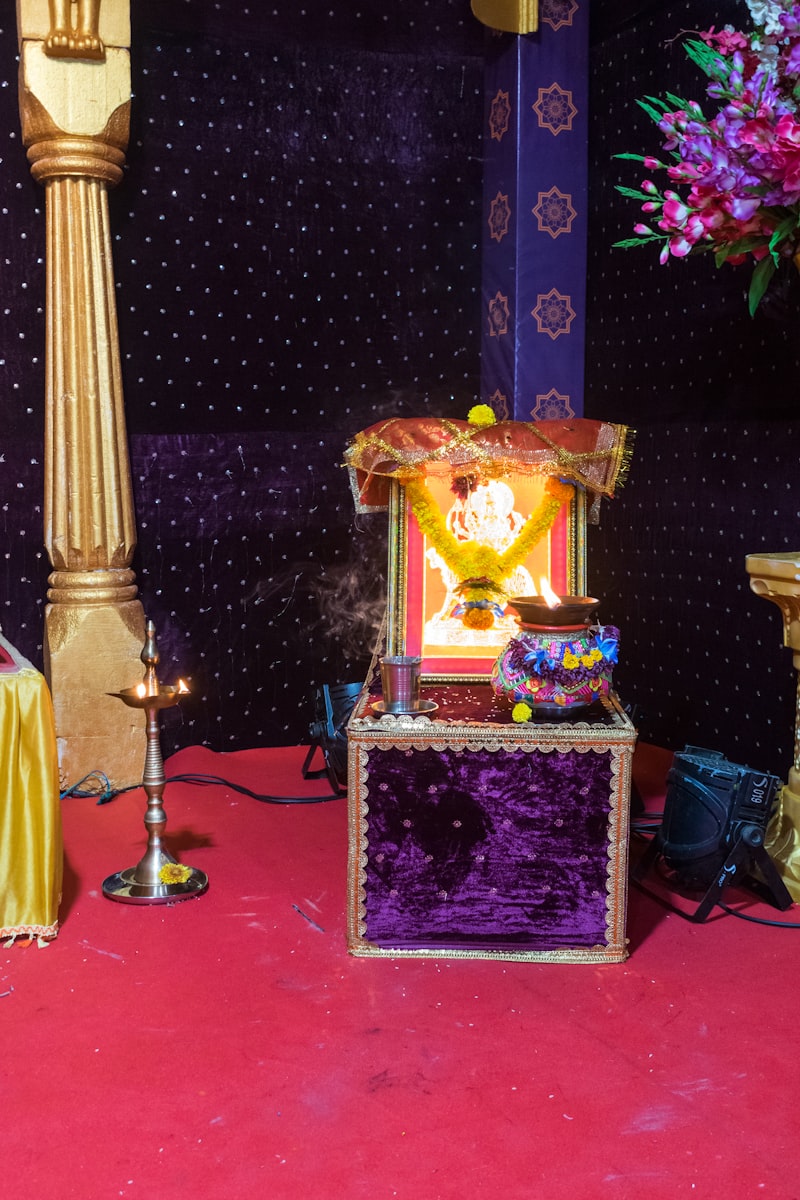 Pooja and festival supplies including diyas, incense and idols at Om Spice and Sweets